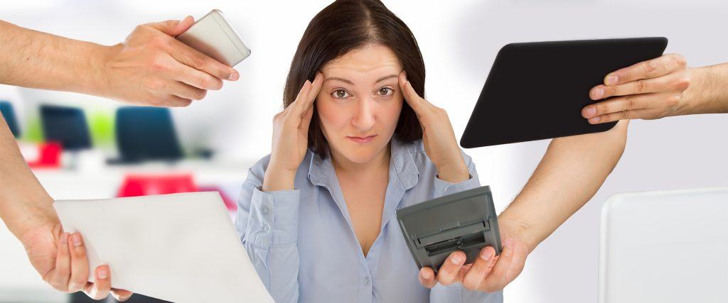business woman overwhelmed with so much work